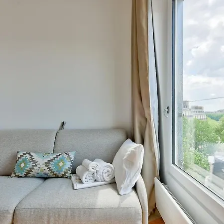 With A Panoramic View Of The Eiffel Tower *